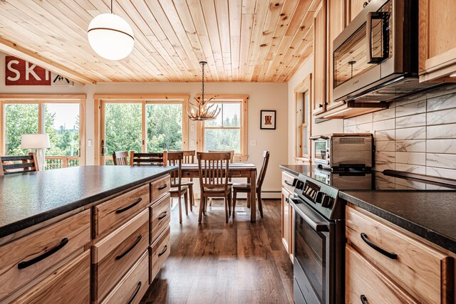 kitchen with appliances with stainless steel finishes, wood ceiling, an inviting chandelier, dark hardwood / wood-style floors, and hanging light fixtures