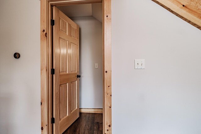 hall with dark hardwood / wood-style floors