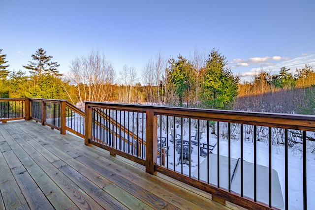 view of snow covered deck