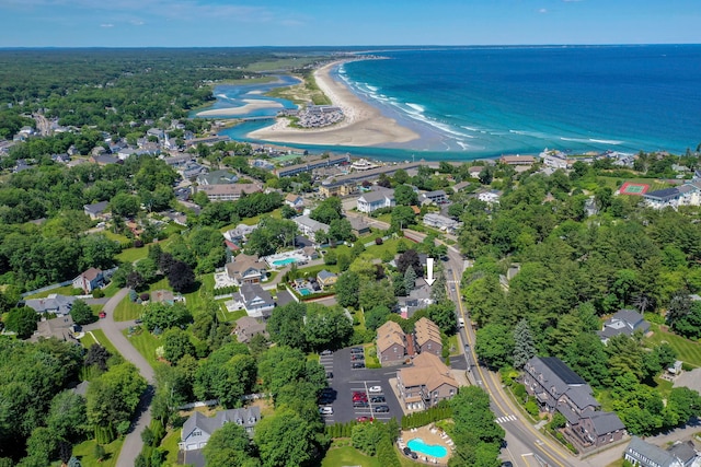 drone / aerial view with a water view and a view of the beach