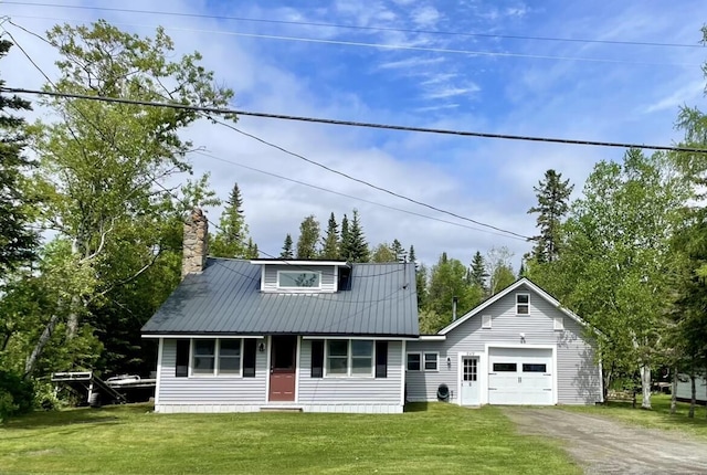 view of front of home with a garage, dirt driveway, a chimney, metal roof, and a front yard