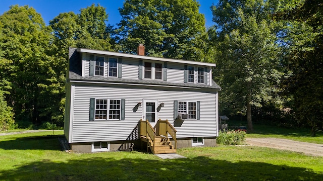 view of front of property with a front lawn