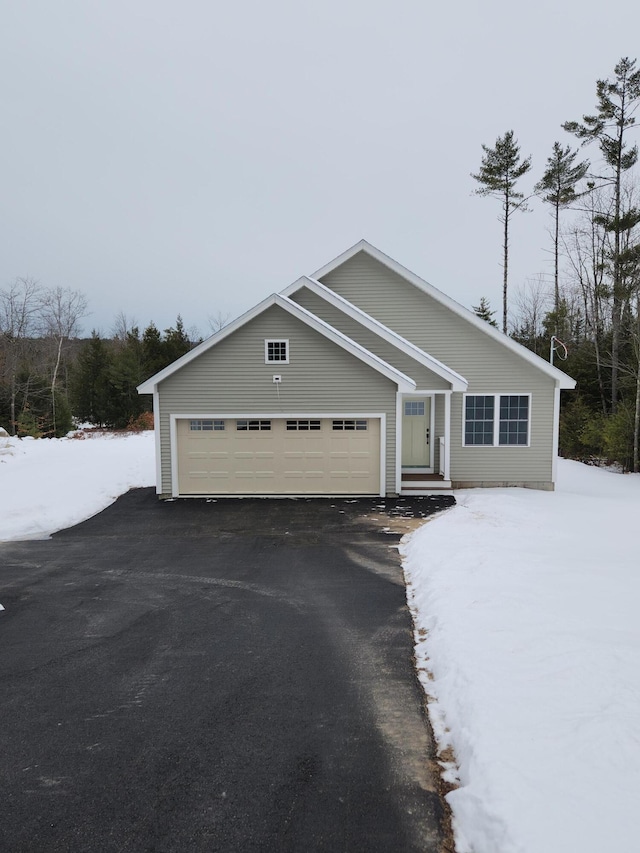 view of front of home with a garage