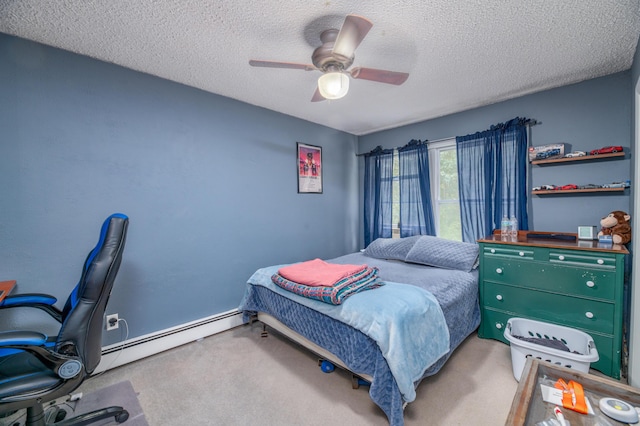 65 Harmony Hills Rd, Readfield, ME 04355 - bedroom with a textured ceiling, a ceiling fan, carpet, and a baseboard radiator