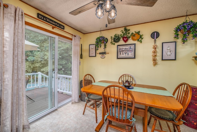 65 Harmony Hills Rd, Readfield, ME 04355 - dining room with a textured ceiling and ceiling fan