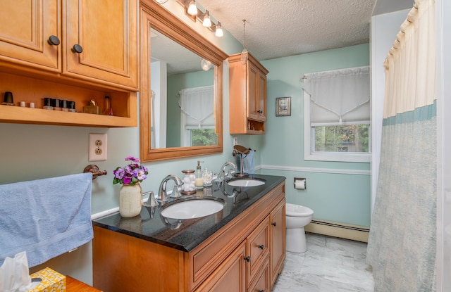 65 Harmony Hills Rd, Readfield, ME 04355 - bathroom with baseboard heating, marble finish floor, toilet, and a sink