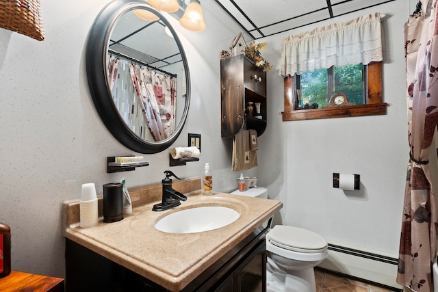 bathroom featuring tile patterned floors, vanity, toilet, and a baseboard heating unit