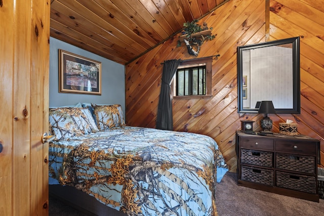 bedroom with wooden walls, dark colored carpet, wooden ceiling, and lofted ceiling