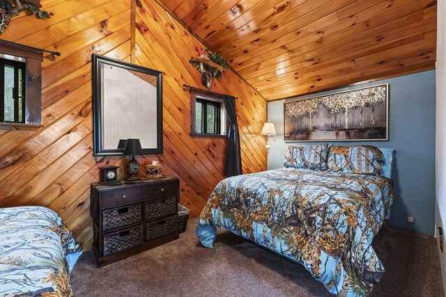 bedroom featuring carpet flooring, wooden walls, wood ceiling, and lofted ceiling