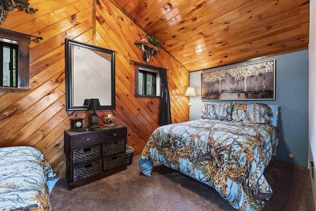 carpeted bedroom with lofted ceiling, wooden ceiling, and wood walls