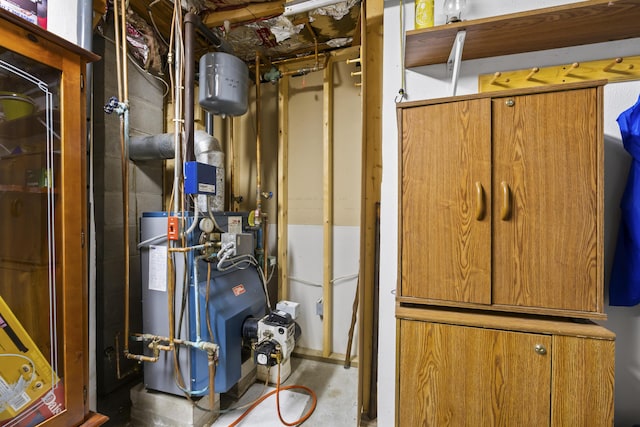 utility room featuring a heating unit