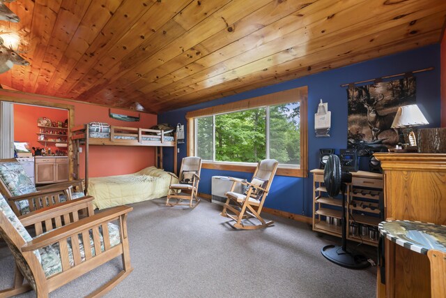 bedroom with lofted ceiling, carpet floors, and wooden ceiling