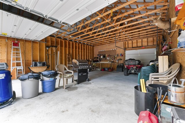 garage featuring a workshop area