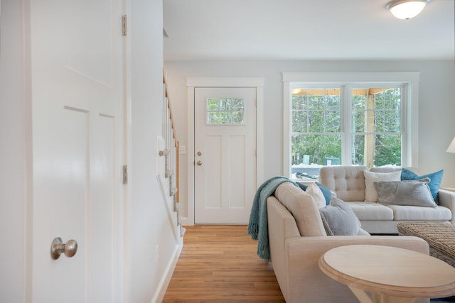 living room with light hardwood / wood-style floors