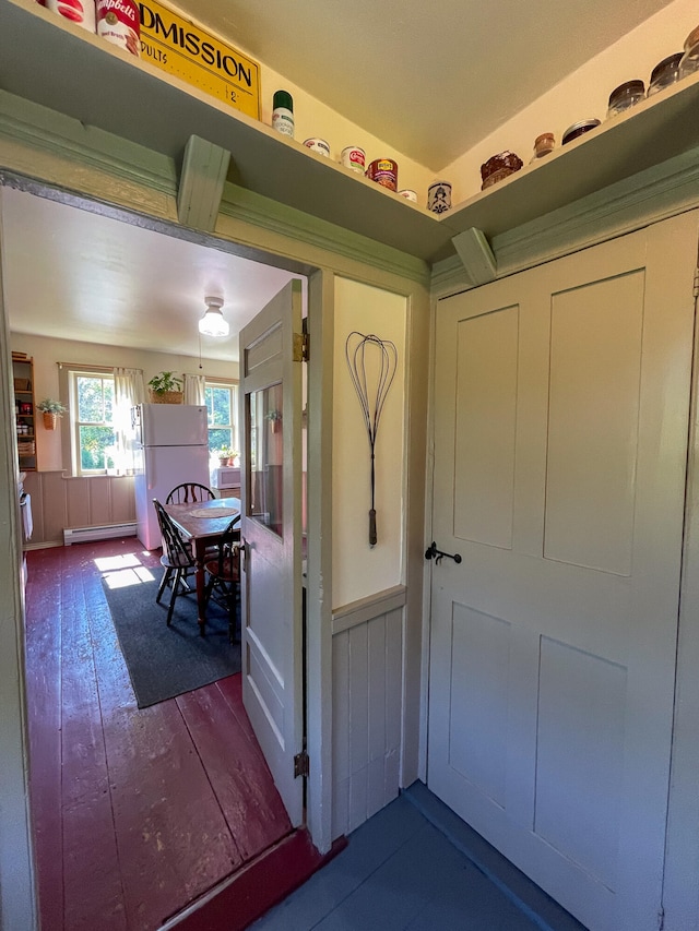 doorway to property with a baseboard radiator