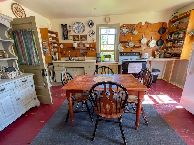 dining room featuring sink