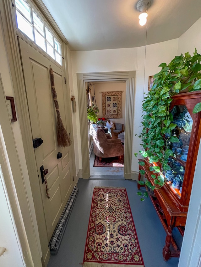 entryway featuring concrete floors