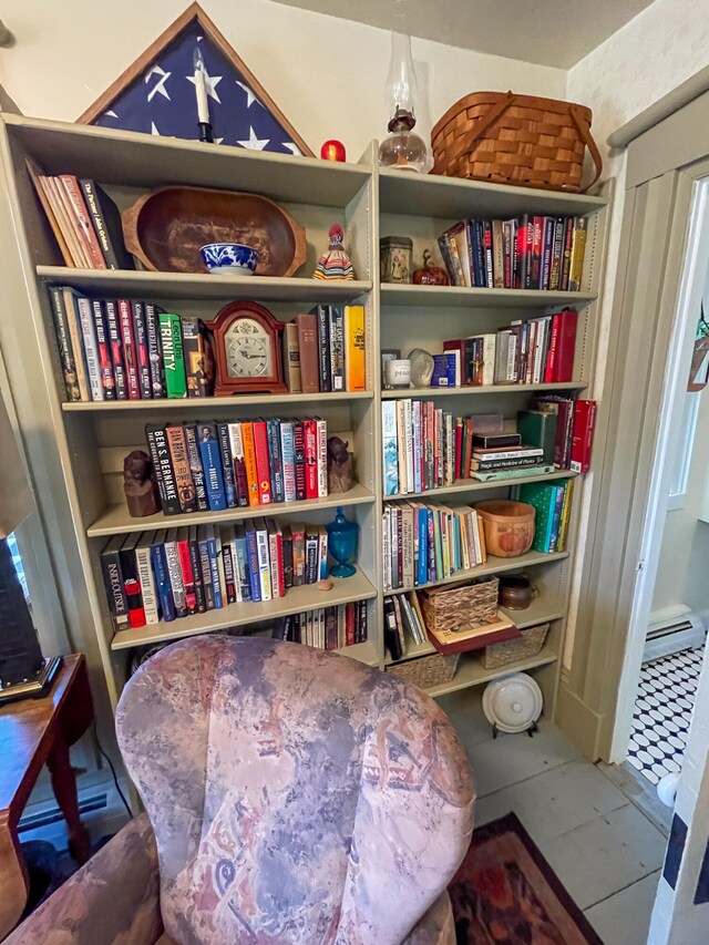 living area featuring tile patterned flooring