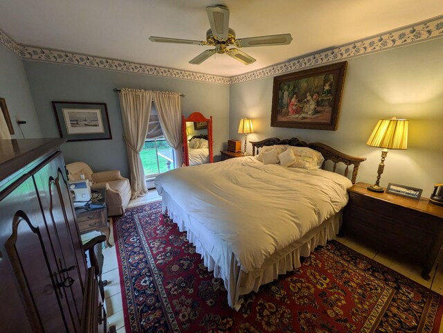 bedroom with ceiling fan and access to outside