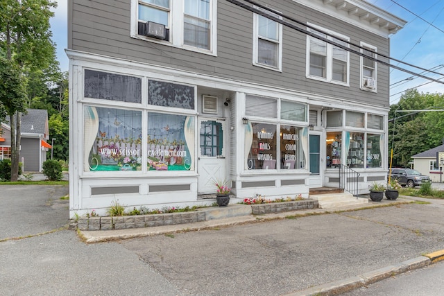 view of front of property with cooling unit