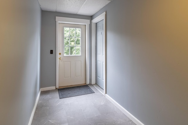 doorway featuring light tile patterned floors