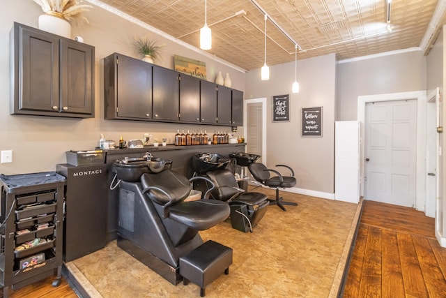 interior space featuring hardwood / wood-style flooring and ornamental molding