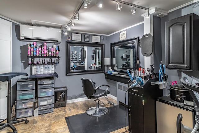 tiled home office with rail lighting, crown molding, a wall mounted AC, and radiator