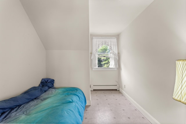 unfurnished bedroom featuring vaulted ceiling and a baseboard radiator