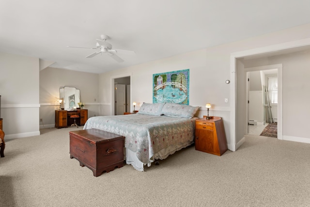 bedroom with ceiling fan and light carpet