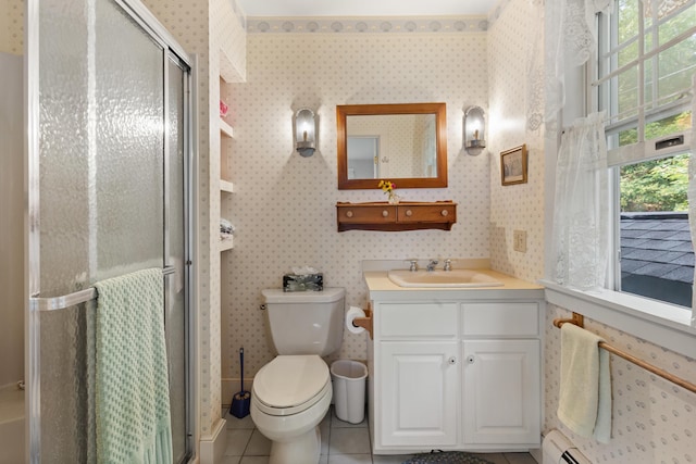 bathroom featuring vanity, a baseboard heating unit, tile patterned flooring, toilet, and a shower with door