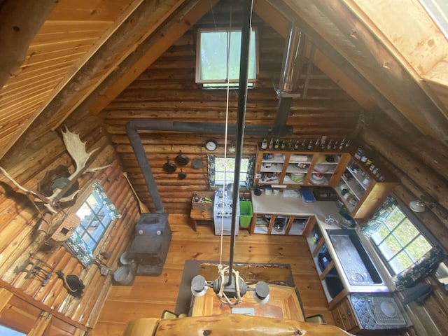 LOT14 Rowe Pond Rd, Pleasant Ridge Plt, ME 04920 - living room with high vaulted ceiling and log walls