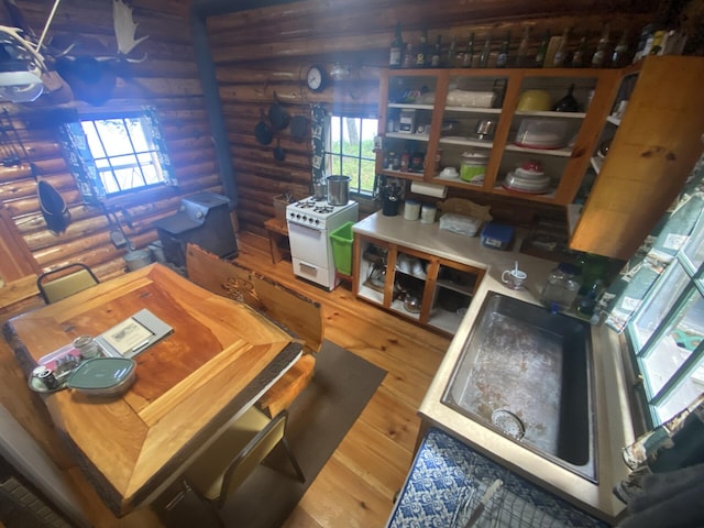 LOT14 Rowe Pond Rd, Pleasant Ridge Plt, ME 04920 - dining room featuring rustic walls and wood finished floors