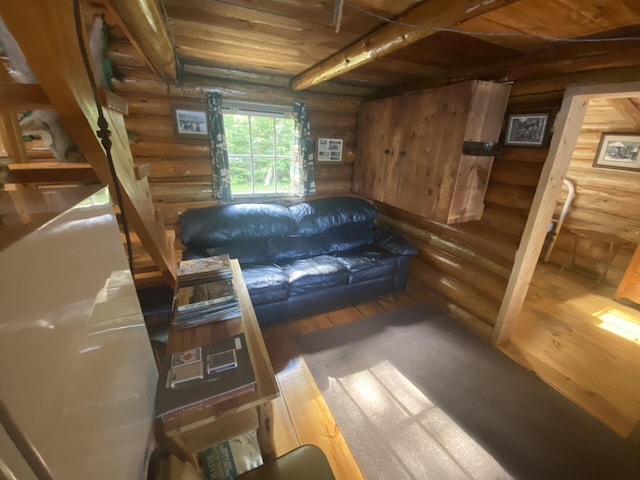 LOT14 Rowe Pond Rd, Pleasant Ridge Plt, ME 04920 - sitting room with log walls, wood-type flooring, and wooden ceiling