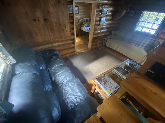 LOT14 Rowe Pond Rd, Pleasant Ridge Plt, ME 04920 - living room featuring log walls and wood finished floors