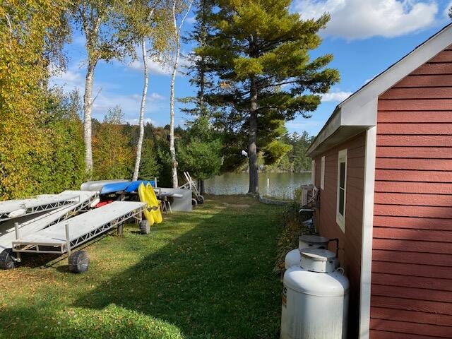 view of yard with a water view