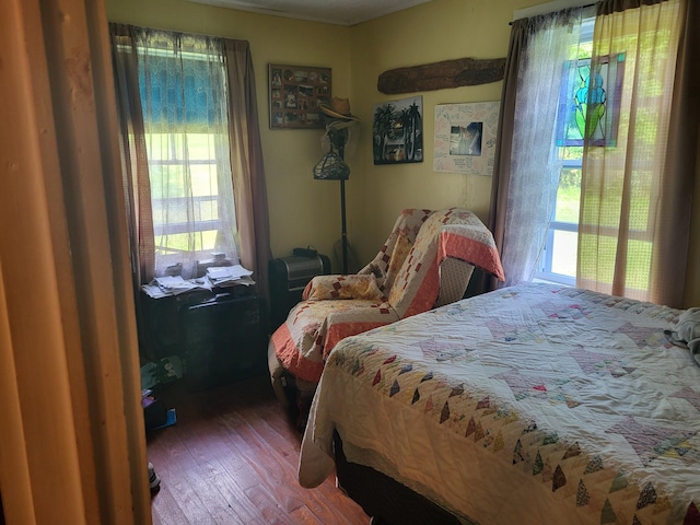 bedroom featuring hardwood / wood-style floors