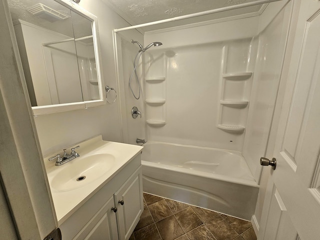 full bathroom featuring shower / washtub combination, visible vents, and vanity