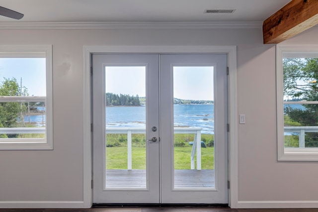 entryway featuring french doors and a water view