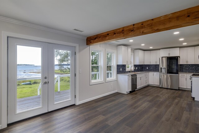 kitchen with white cabinets, french doors, stainless steel appliances, and dark hardwood / wood-style flooring