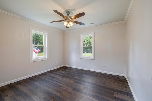 empty room with hardwood / wood-style floors, crown molding, plenty of natural light, and ceiling fan