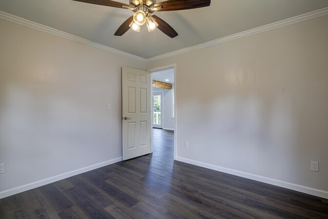 empty room with ceiling fan, dark hardwood / wood-style flooring, and crown molding