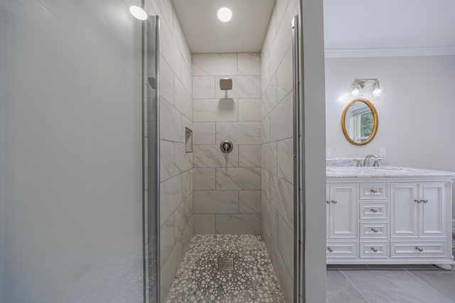 bathroom with tile patterned floors, vanity, walk in shower, and crown molding