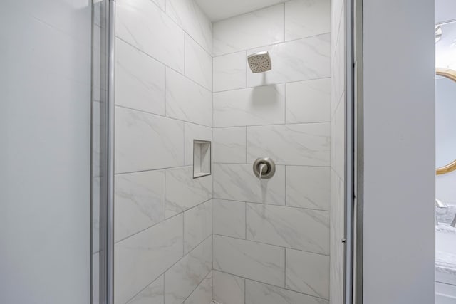 bathroom featuring an enclosed shower