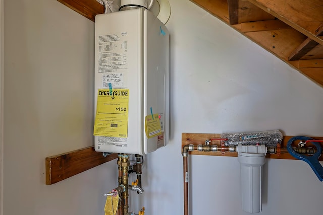 utility room with water heater