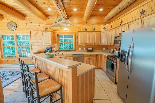 kitchen featuring plenty of natural light, stainless steel appliances, wooden ceiling, and light countertops