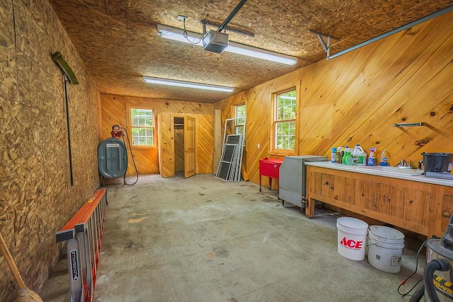 interior space featuring a garage and concrete floors