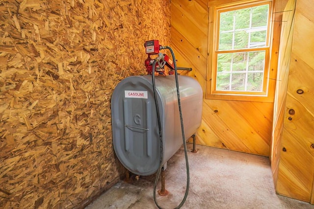 interior details featuring wooden walls and heating fuel