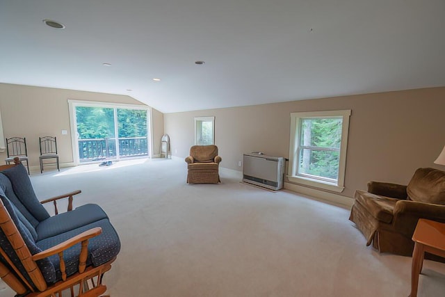 sitting room with light carpet, vaulted ceiling, and recessed lighting