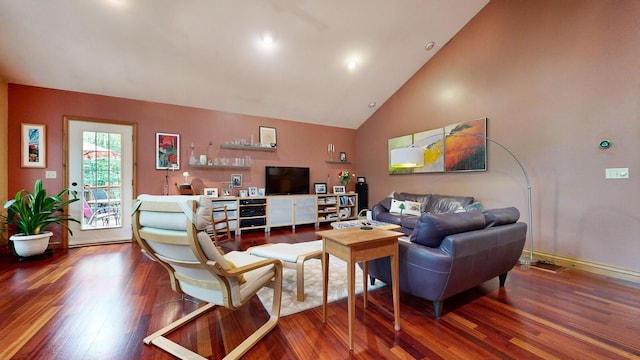 living room featuring high vaulted ceiling, baseboards, and wood finished floors