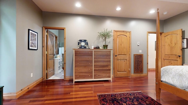 bedroom with baseboards, dark wood-style flooring, and recessed lighting